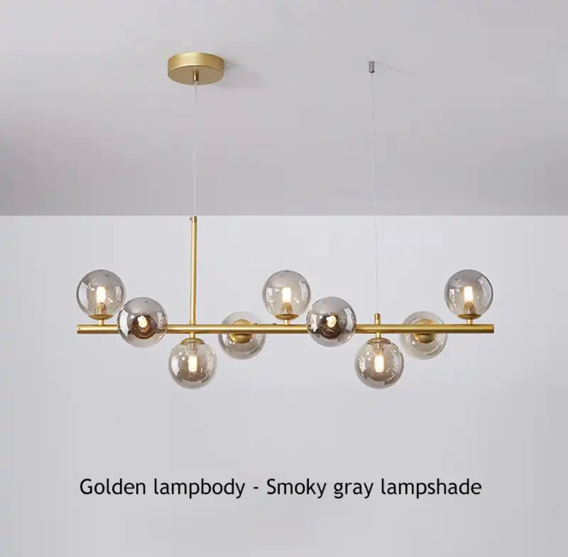 Gold multiple head pendant