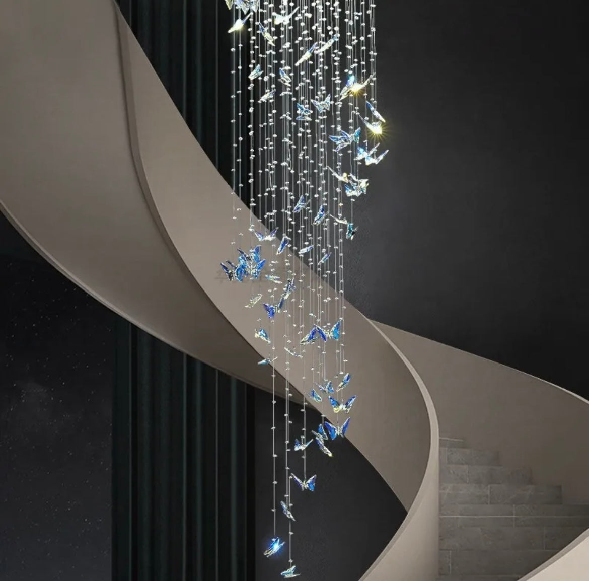 Glamorous stair chandelier with butterflies