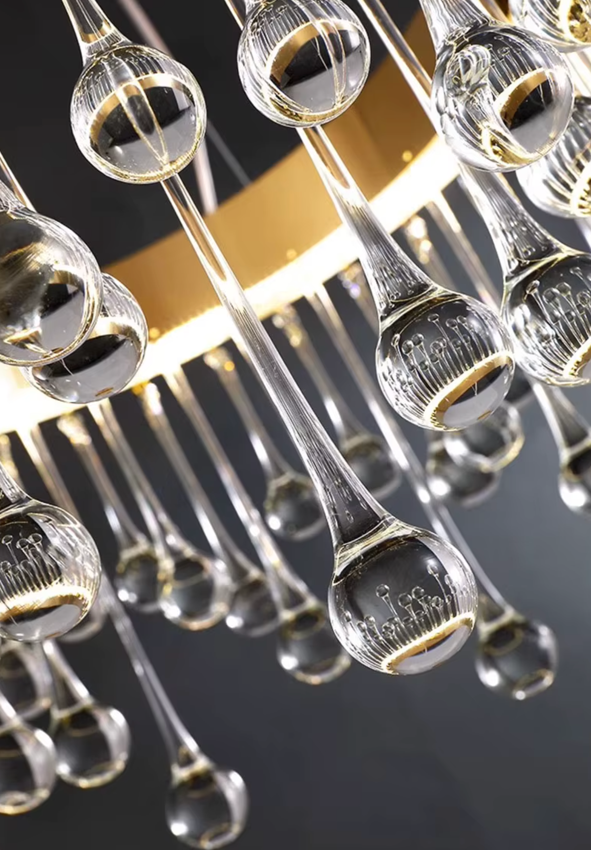 Modern gold chandelier with crystal droplets