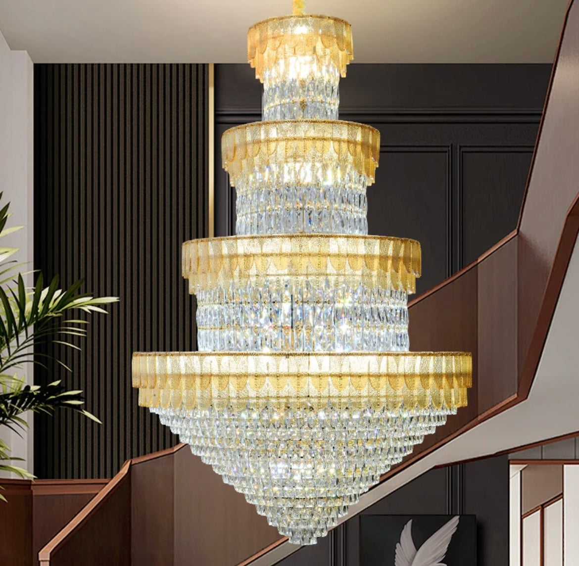 Extra large stairwell chandelier creating luxury lighting solutions