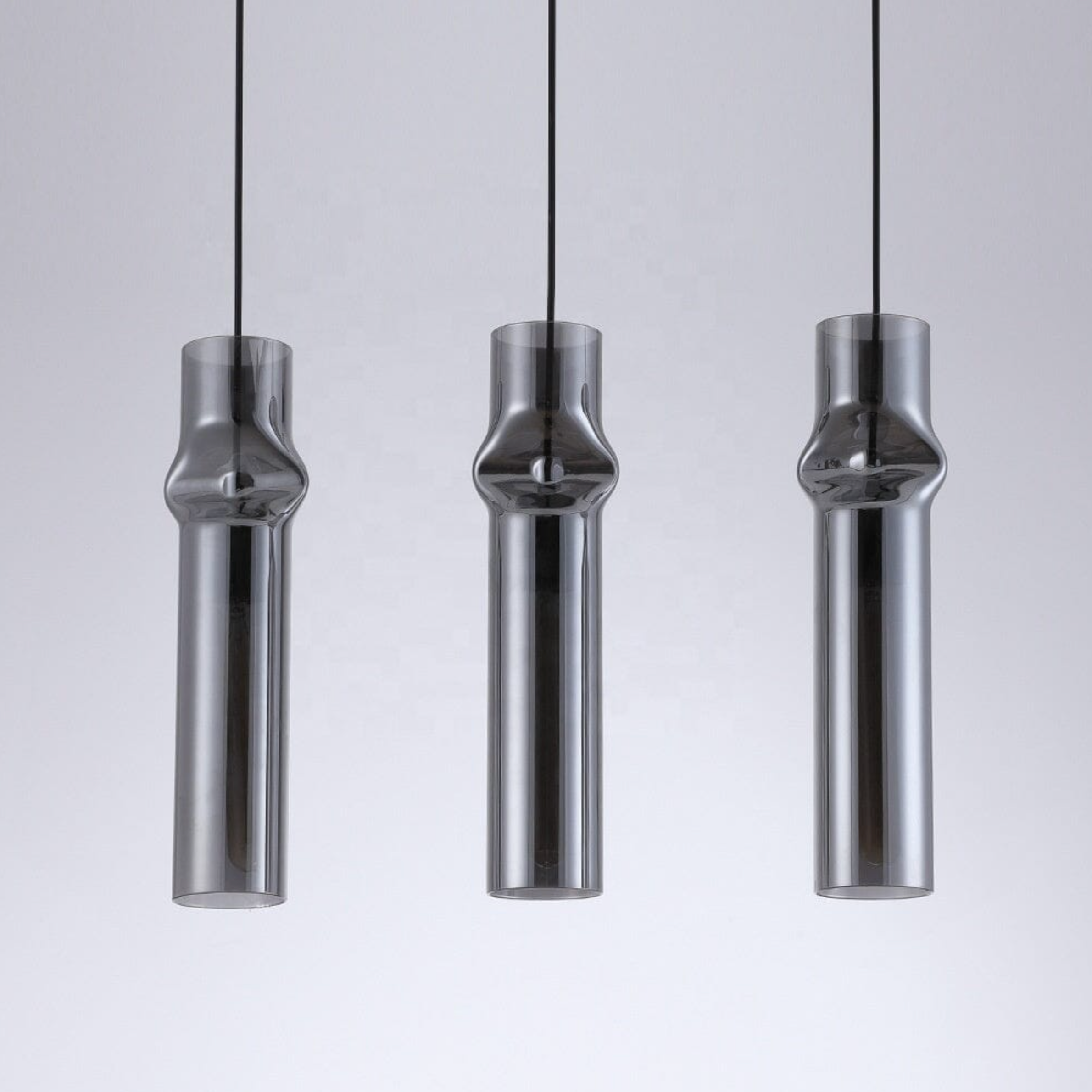 3 hanging cylindrical pendant lighting