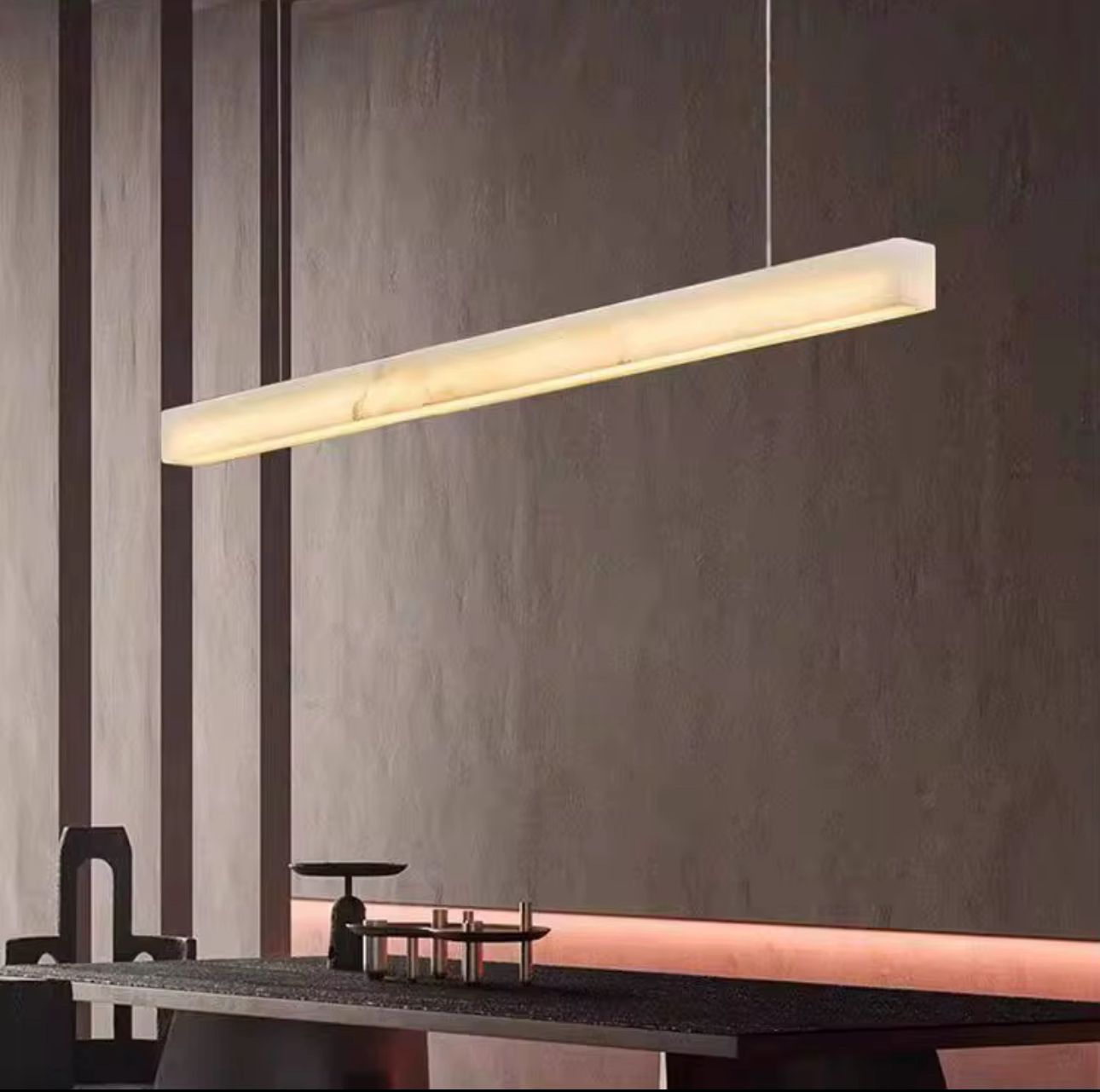 Minimalist marble linear ceiling light in contemporary kitchen interior