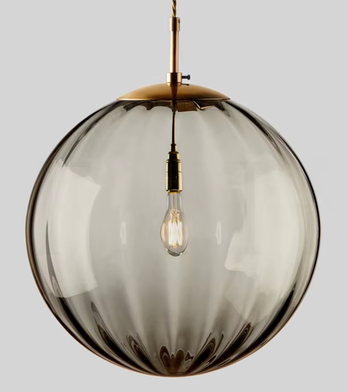 Hanging pendant light in grey cirlce