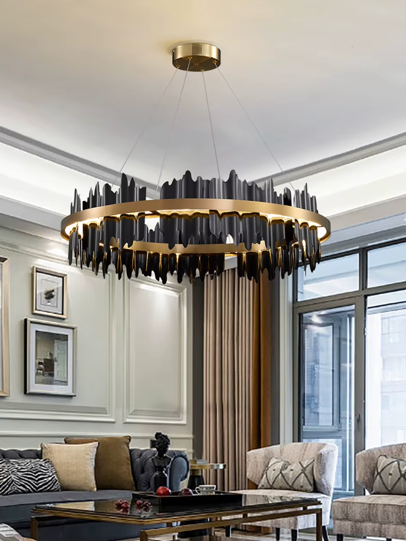 circular black chandelier with gold frame