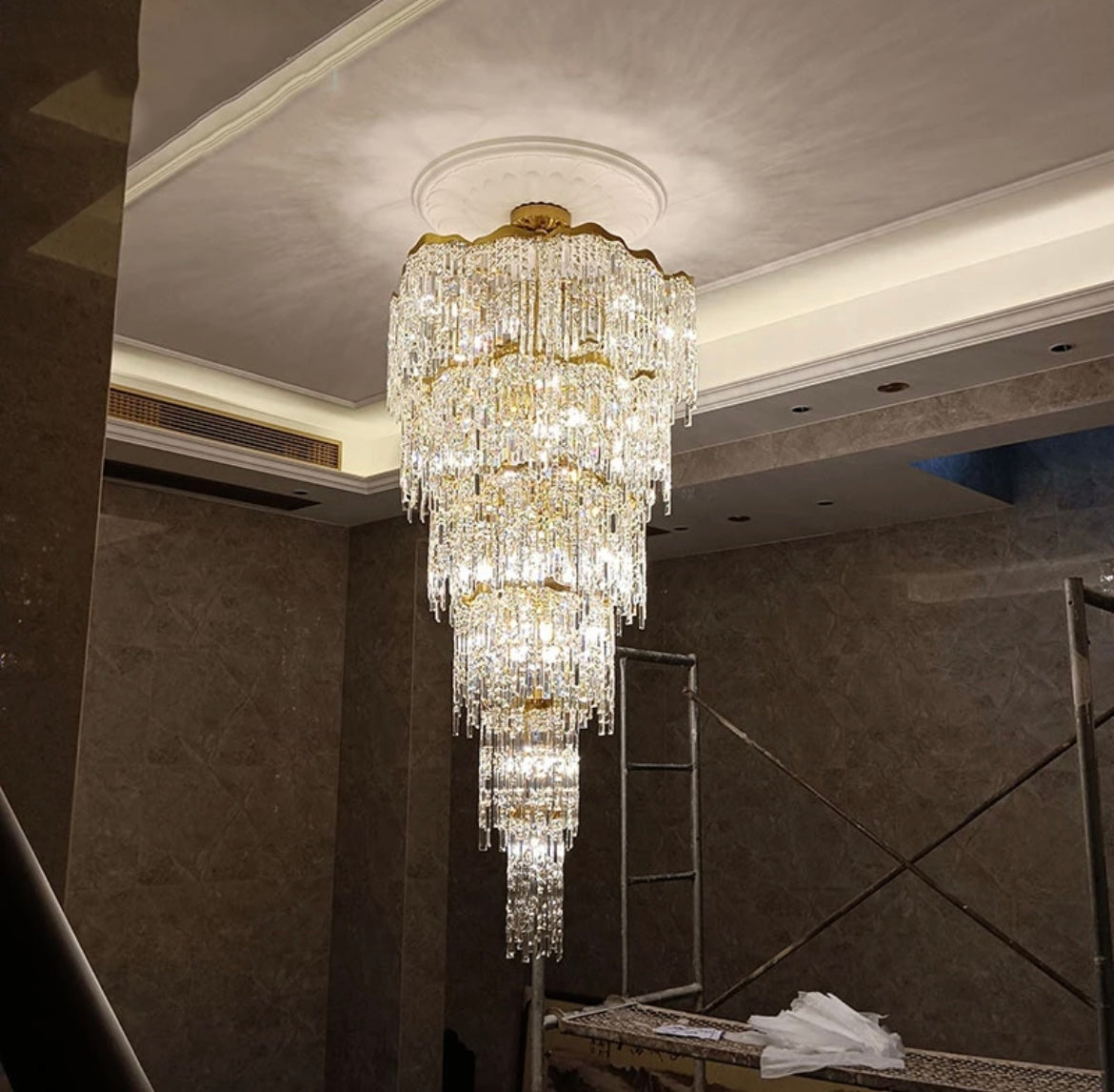 Sophisticated Lighting: Gold Art Staircase Chandelier