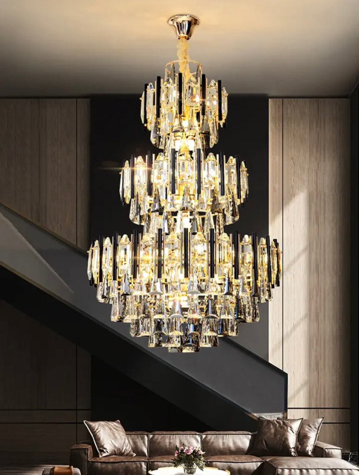 Elegant large crystal chandelier gracing a sophisticated foyer