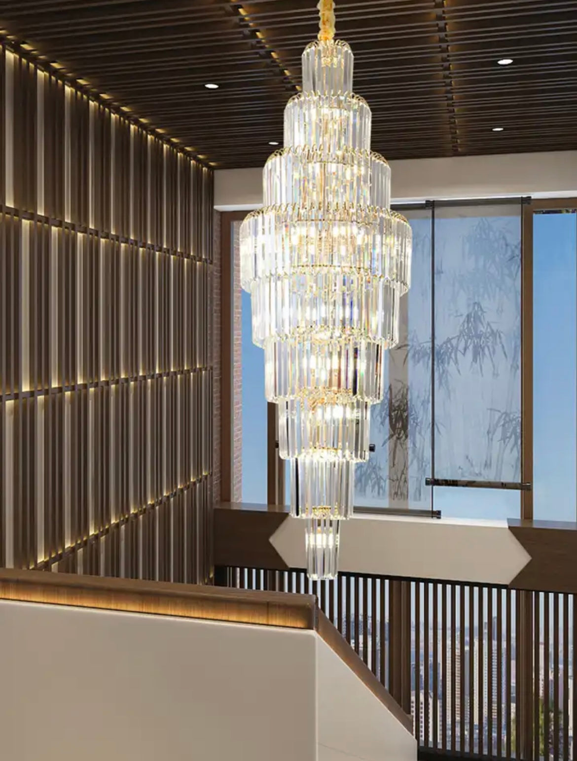 long staircase chandelier for stairwell