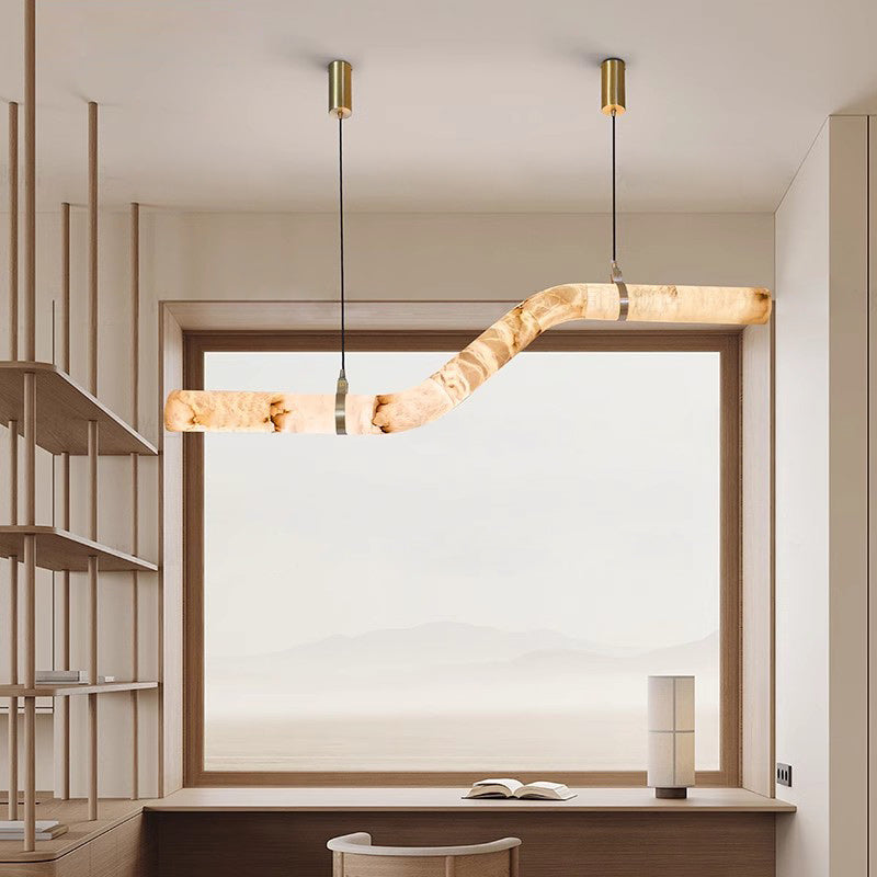 Modern pendant light fixture in a minimalistic interior setting
